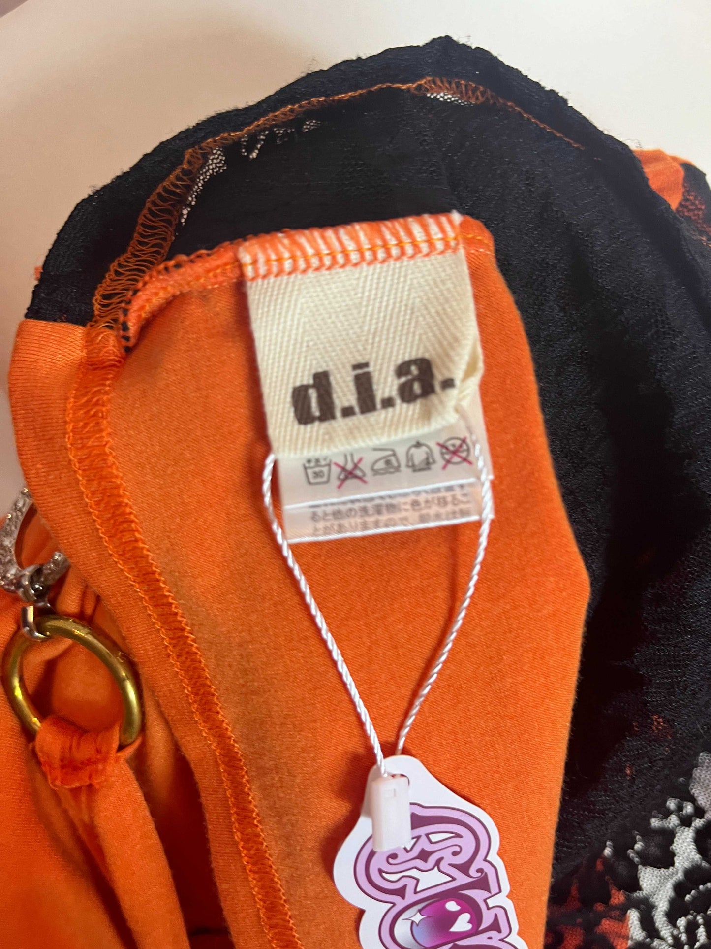 d.i.a Orange and Black Halter Top