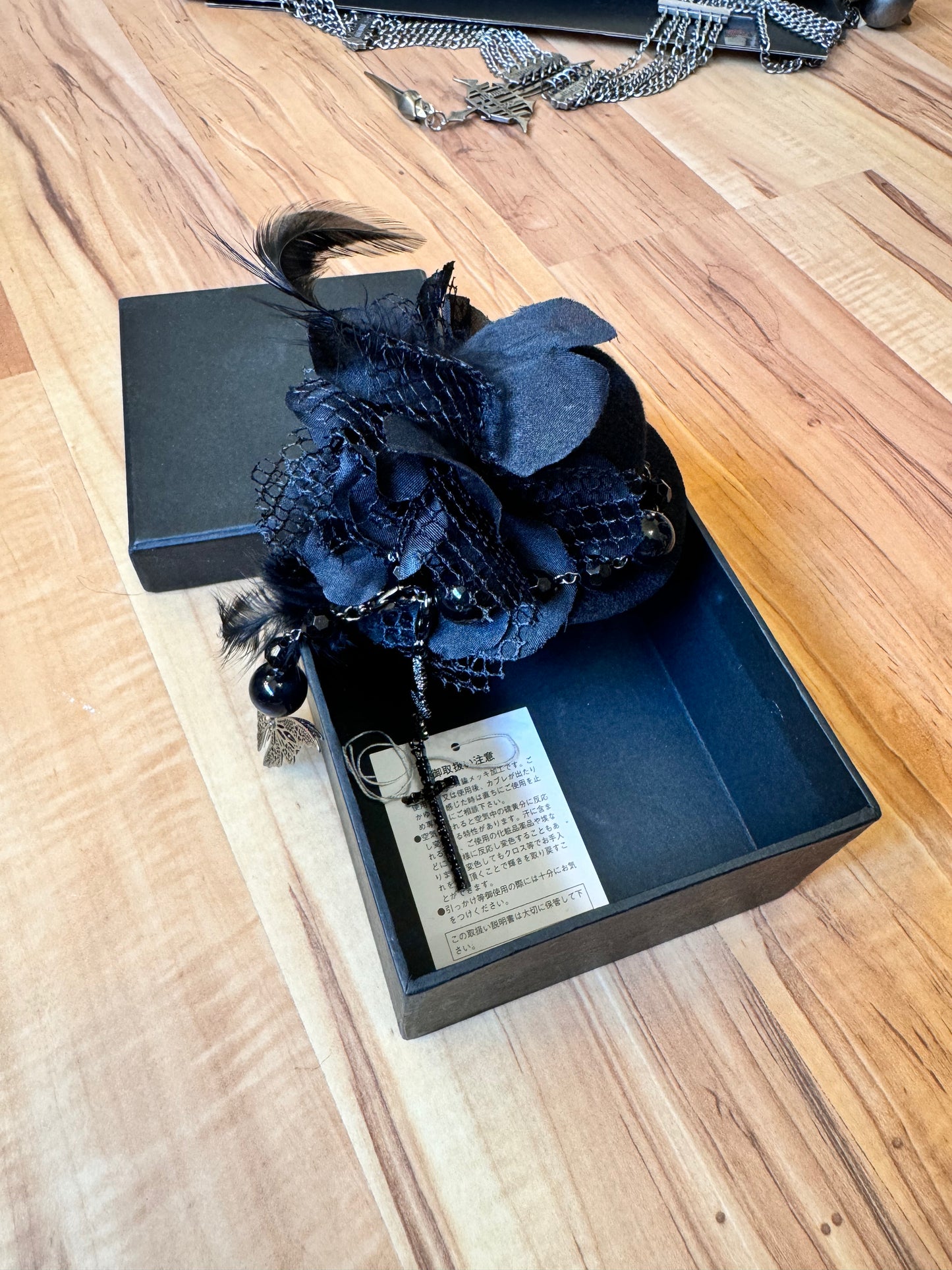 Black Peace Now Feather and Jewel Hairclip