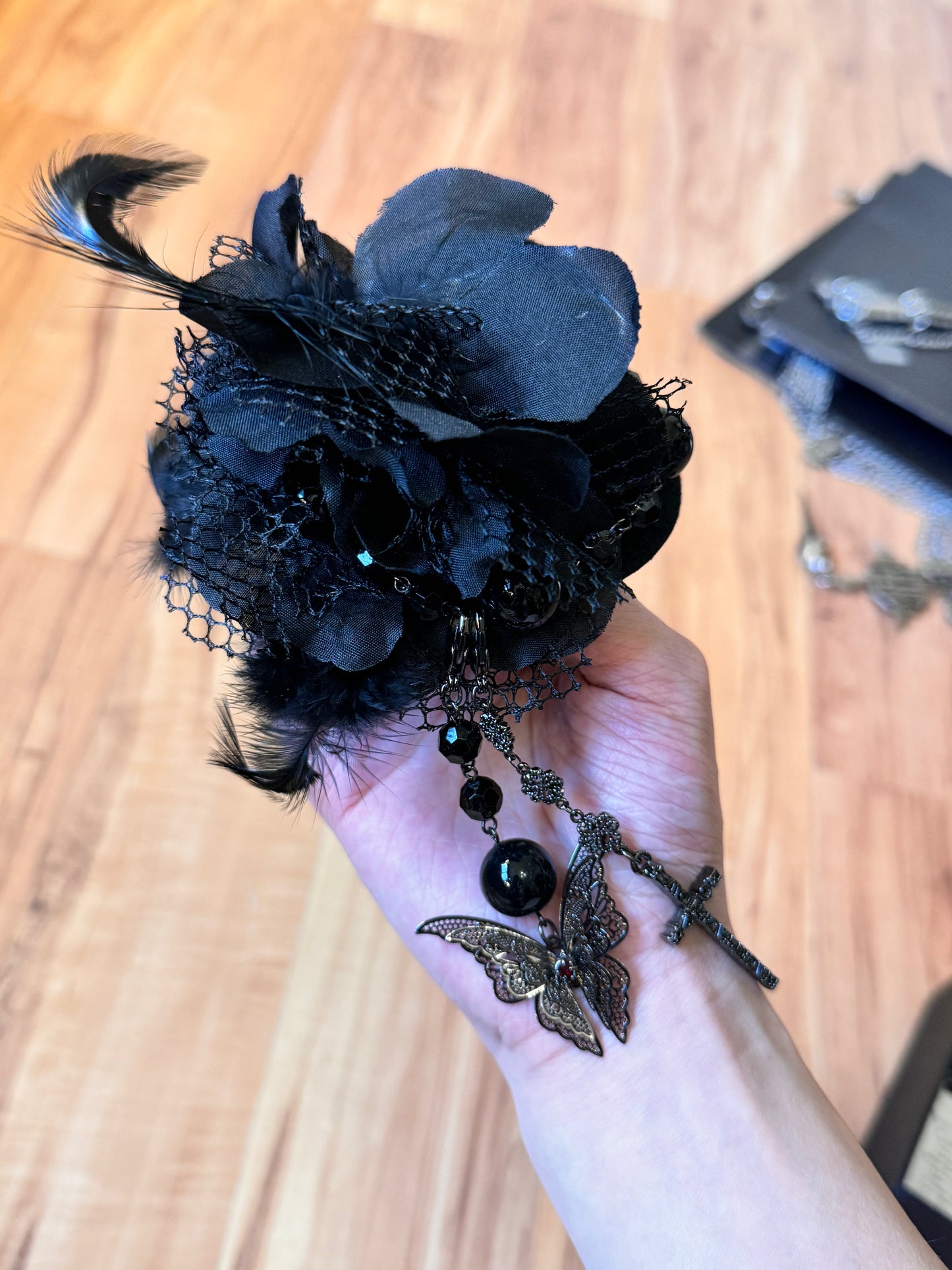 Black Peace Now Feather and Jewel Hairclip