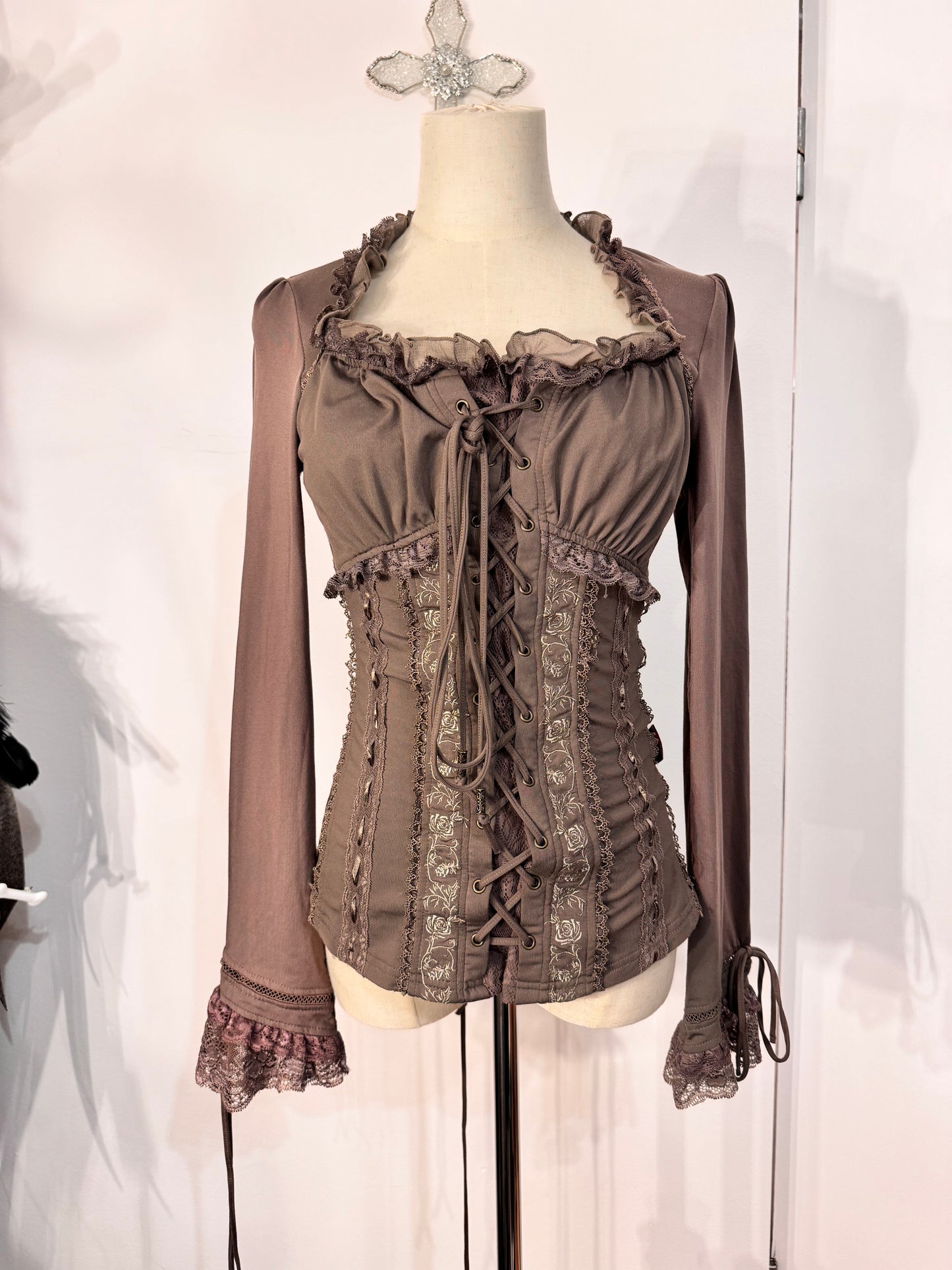 OZZ ON Lace-Up Long-Sleeves Top