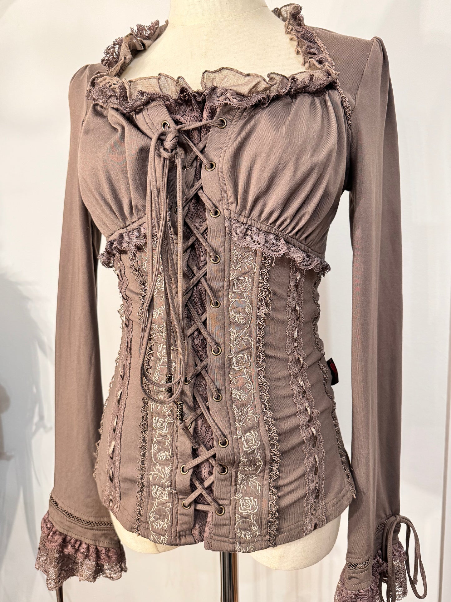 OZZ ON Lace-Up Long-Sleeves Top